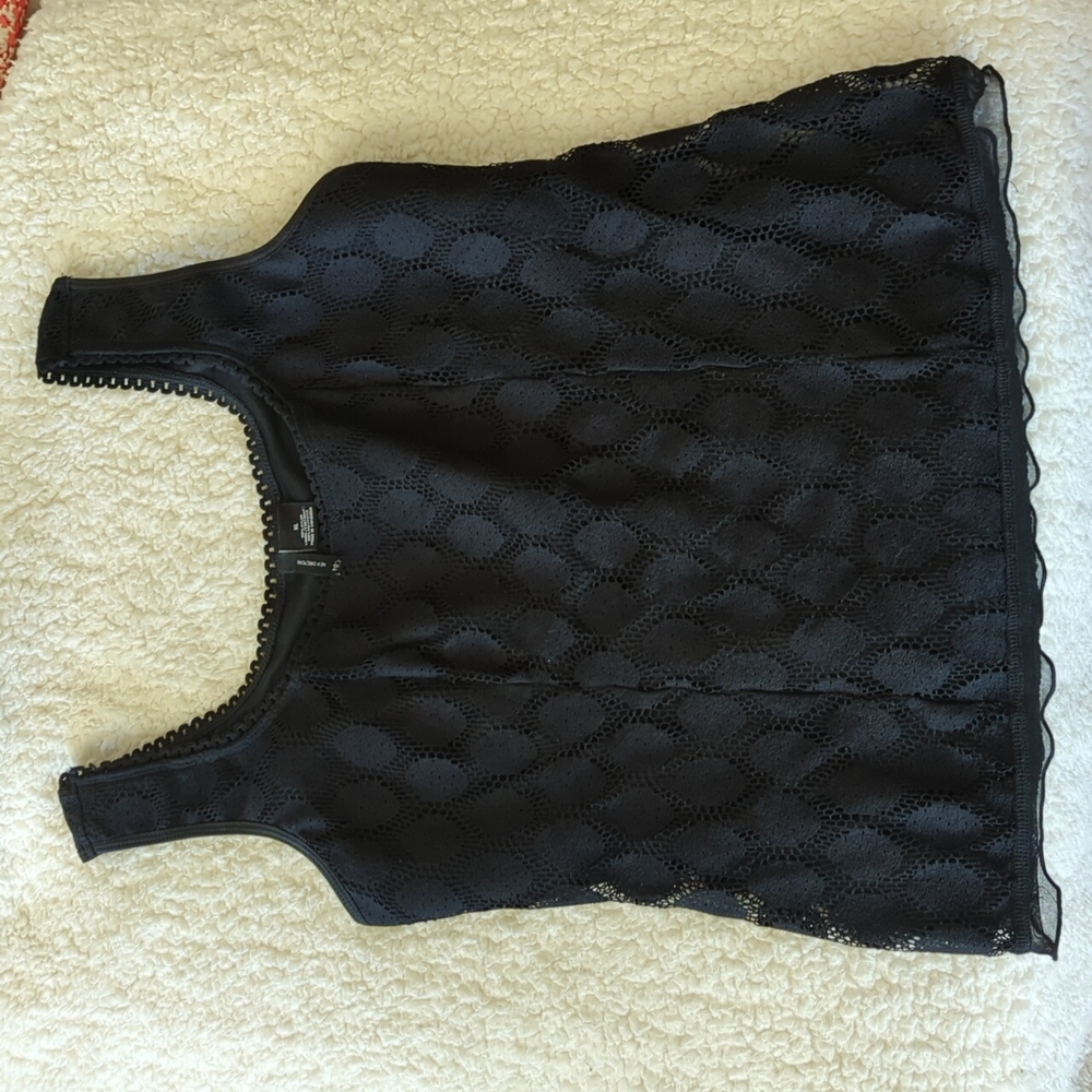 Extra large lace sleeveless top. Fully lined.